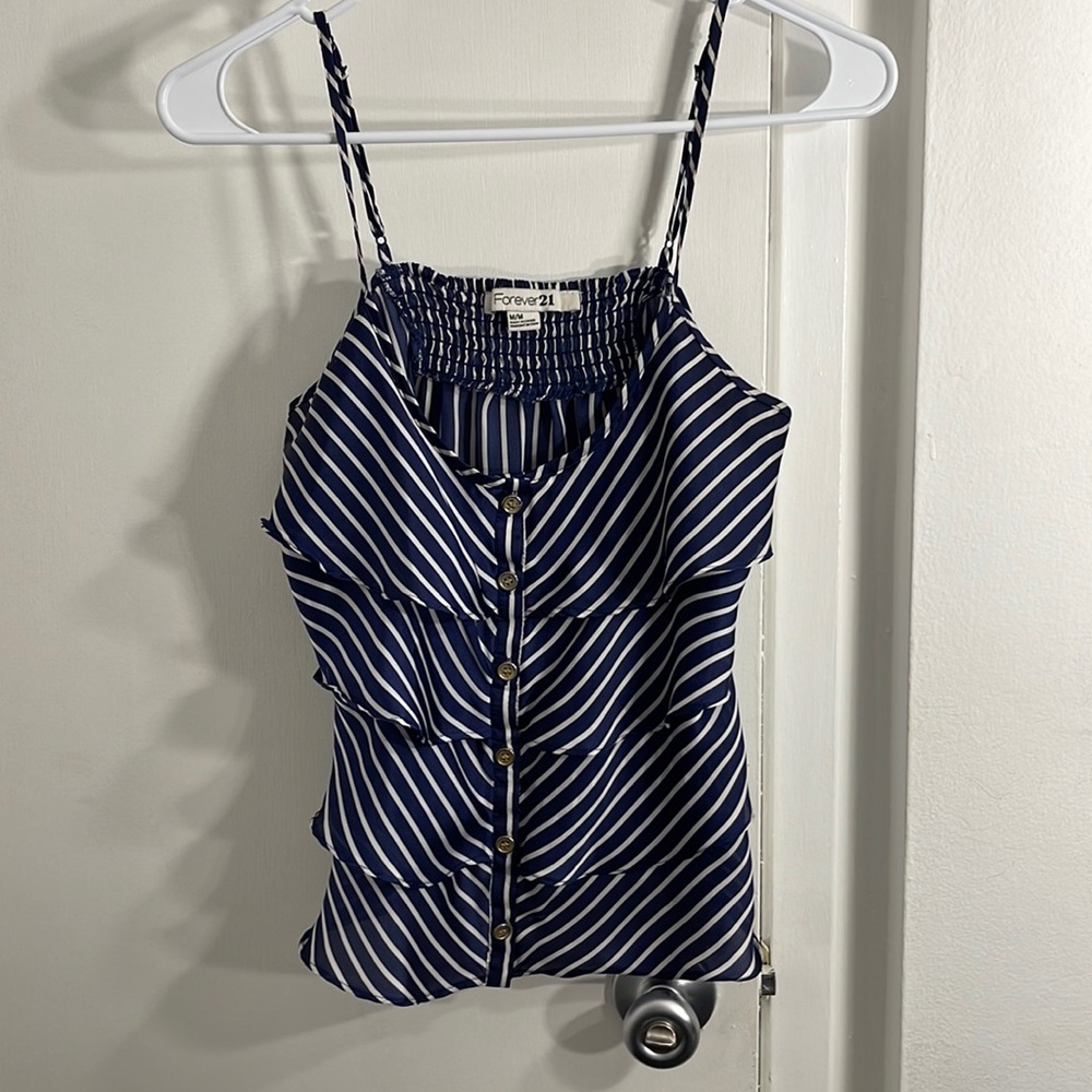 Shiny navy blue and white striped ruffled tank with gold buttons